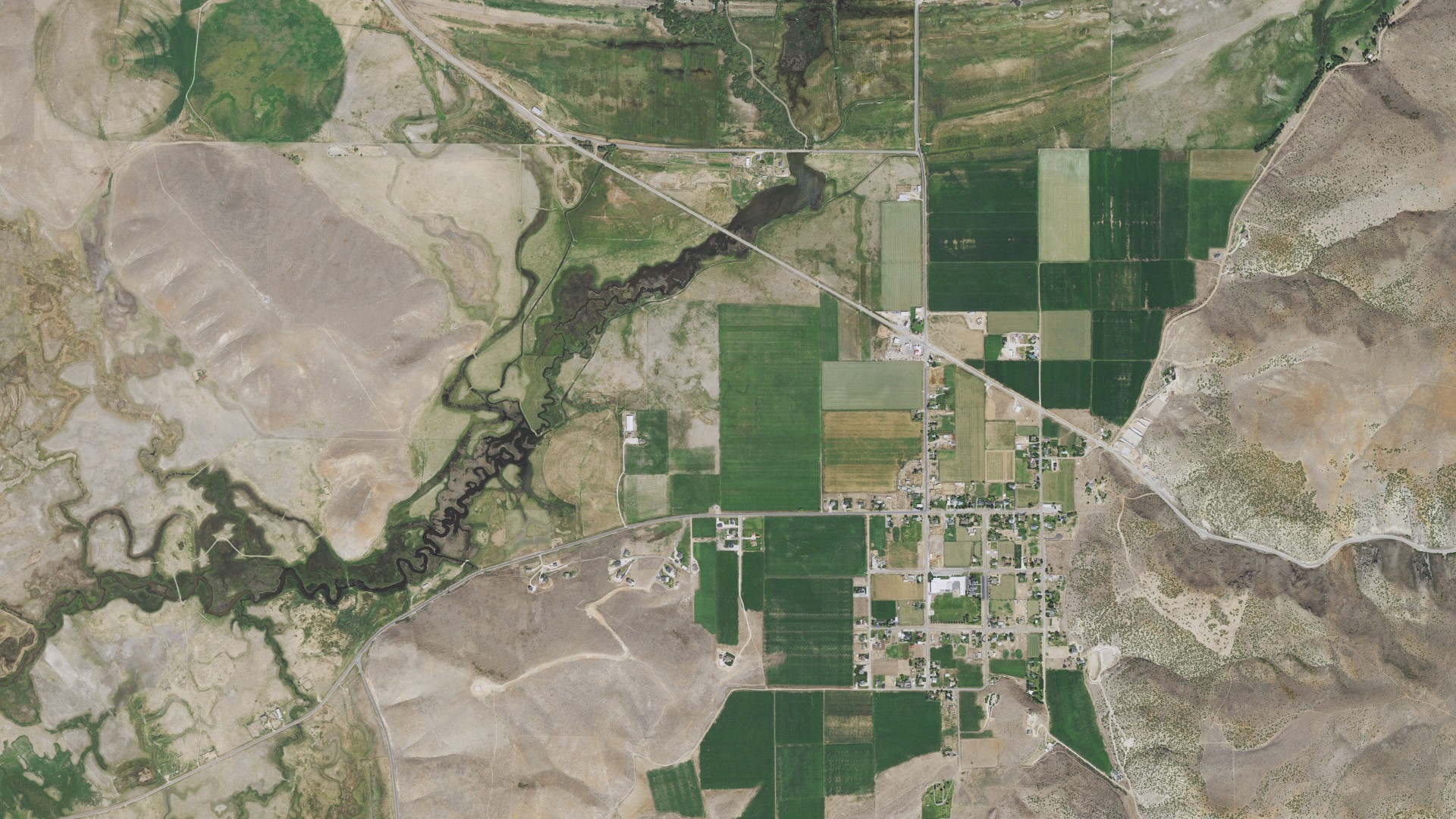 Natural-color aerial photograph of land around Laketown, Utah