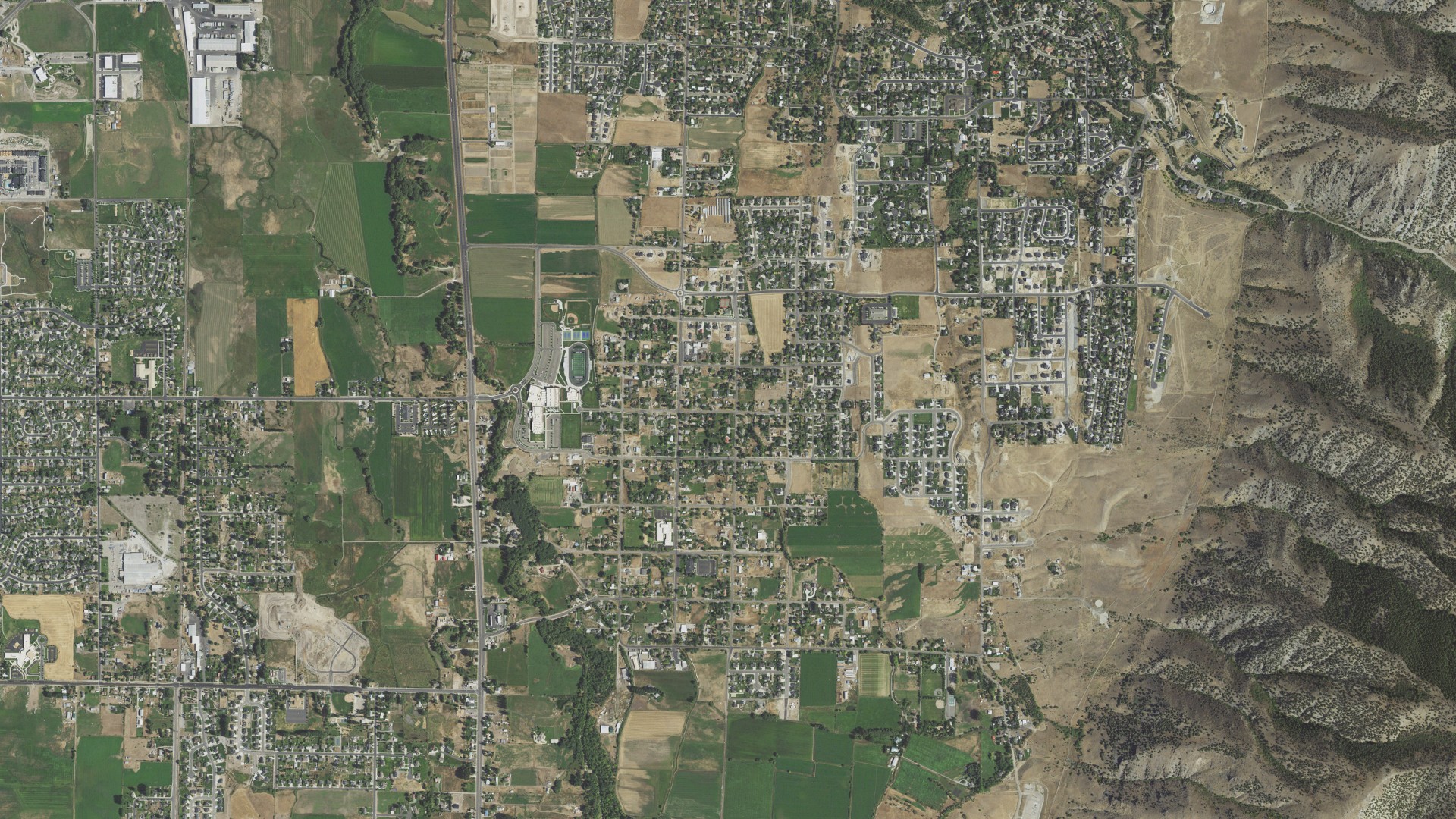 Natural-color aerial photograph of land around Millville, Utah