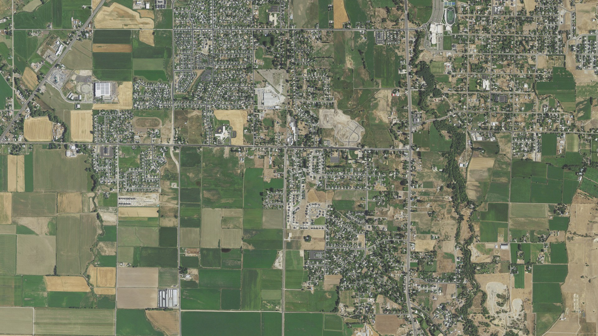 Natural-color aerial photograph of land around Nibley, Utah