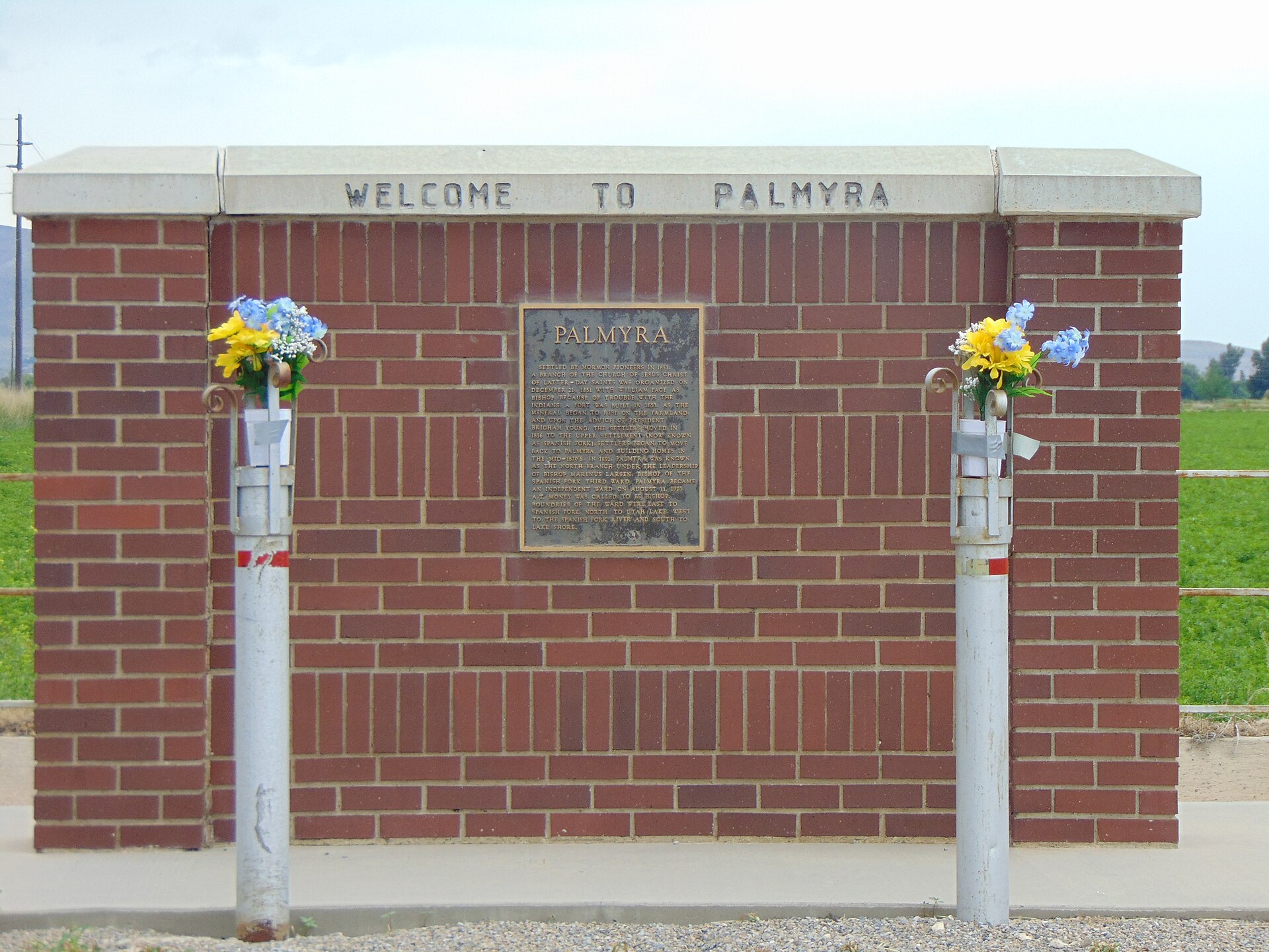 The Welcome Palmyra sign & plaque at the south end of Palmyra Drive, just north of West 5950 South, in Palmyra, Utah, June 2016