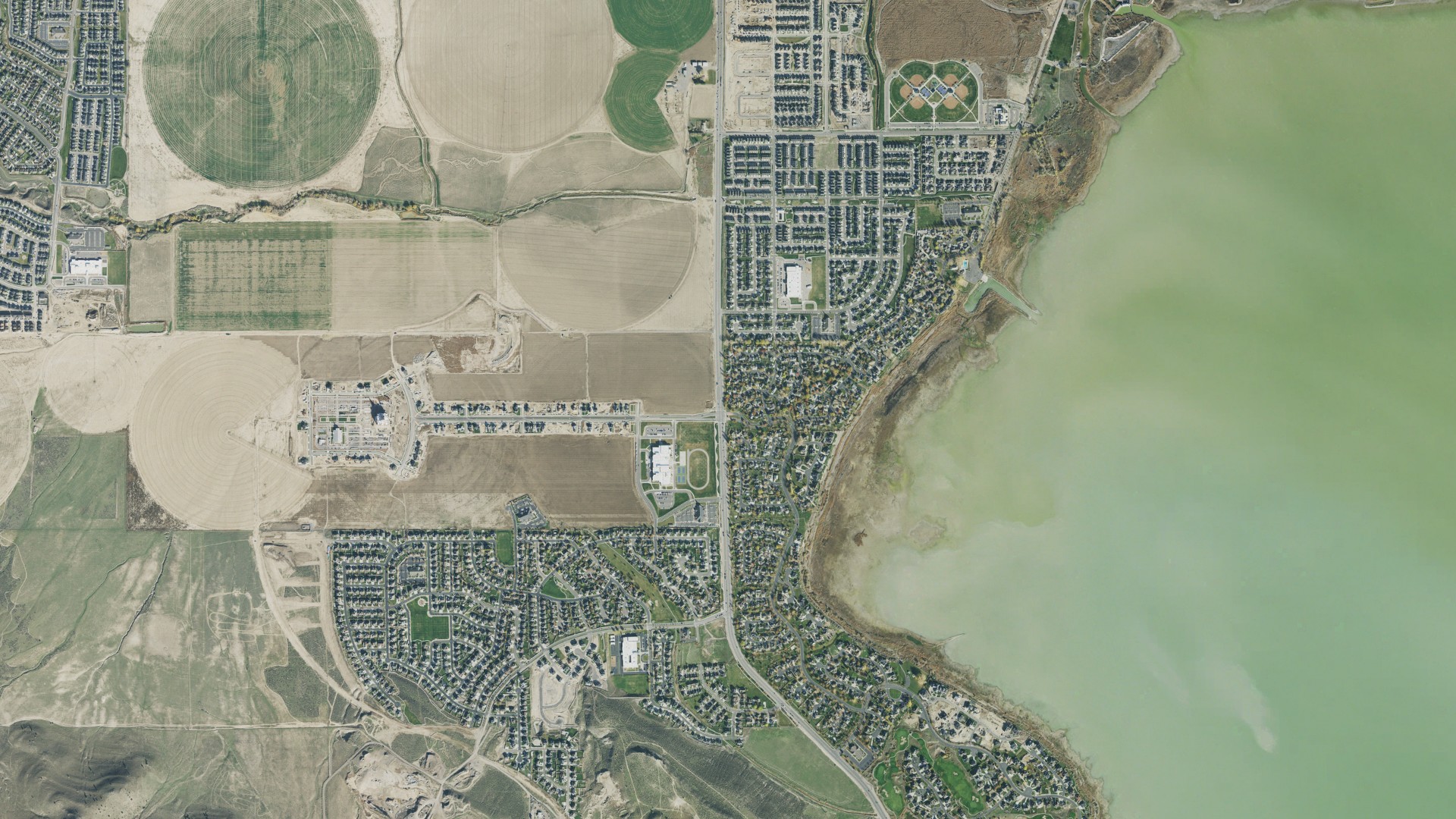 Natural-color aerial photograph of land around Saratoga Springs, Utah