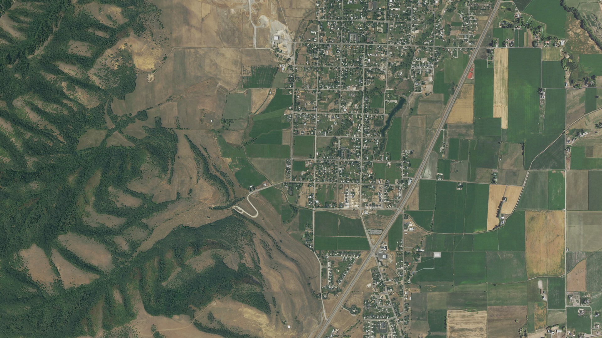 Natural-color aerial photograph of land around Wellsville, Utah