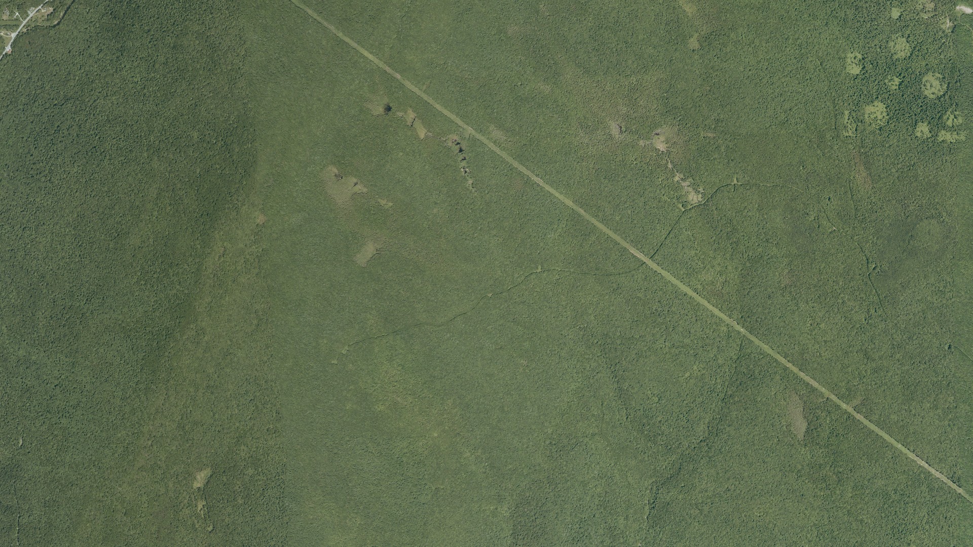 Natural-color aerial photograph of land around Winhall, Vermont