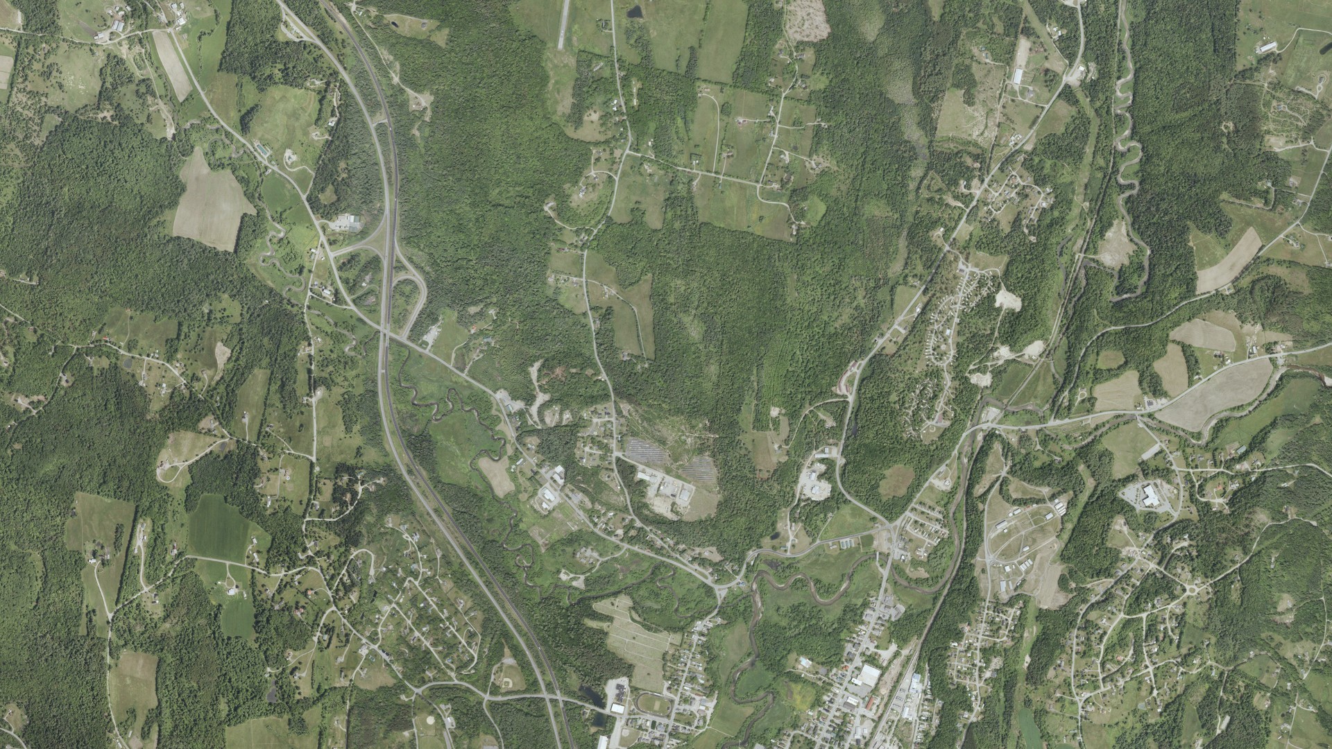 Natural-color aerial photograph of land around Lyndon, Vermont