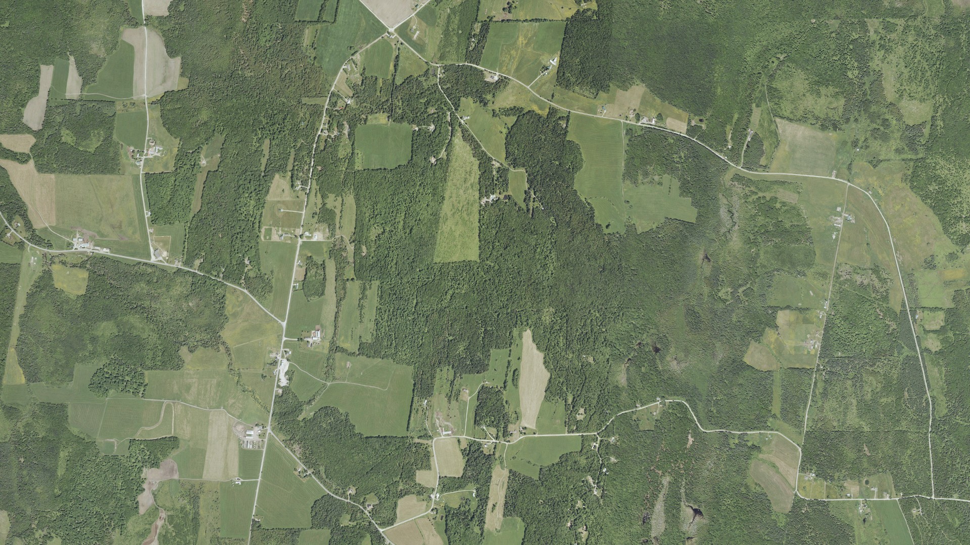 Natural-color aerial photograph of land around Holland, Vermont