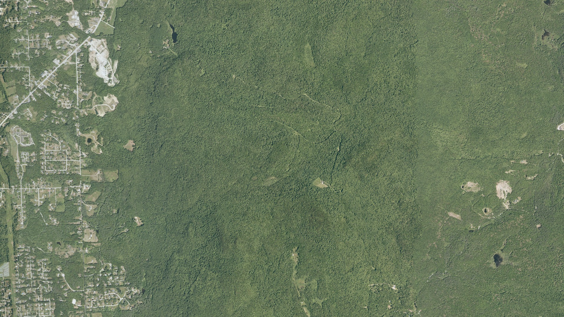 Natural-color aerial photograph of land around Mendon, Vermont