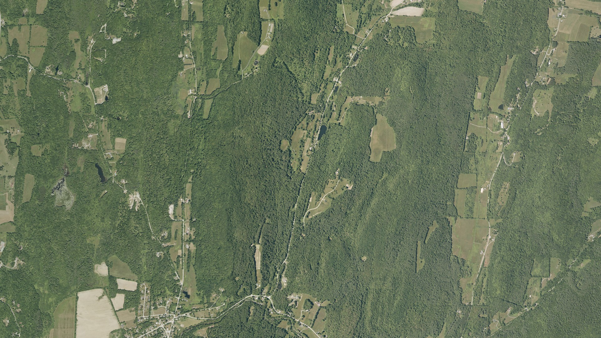 Natural-color aerial photograph of land around Poultney, Vermont
