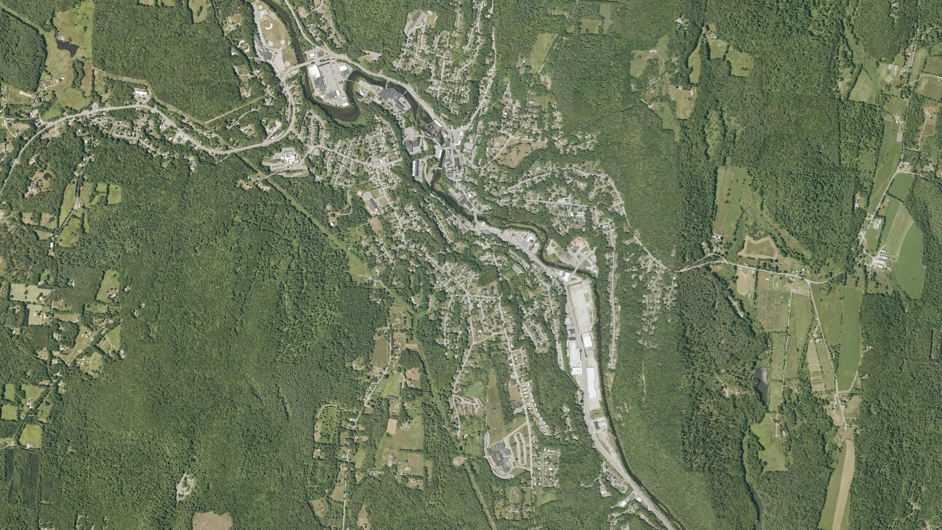 Natural-color aerial photograph of land around Springfield, Vermont