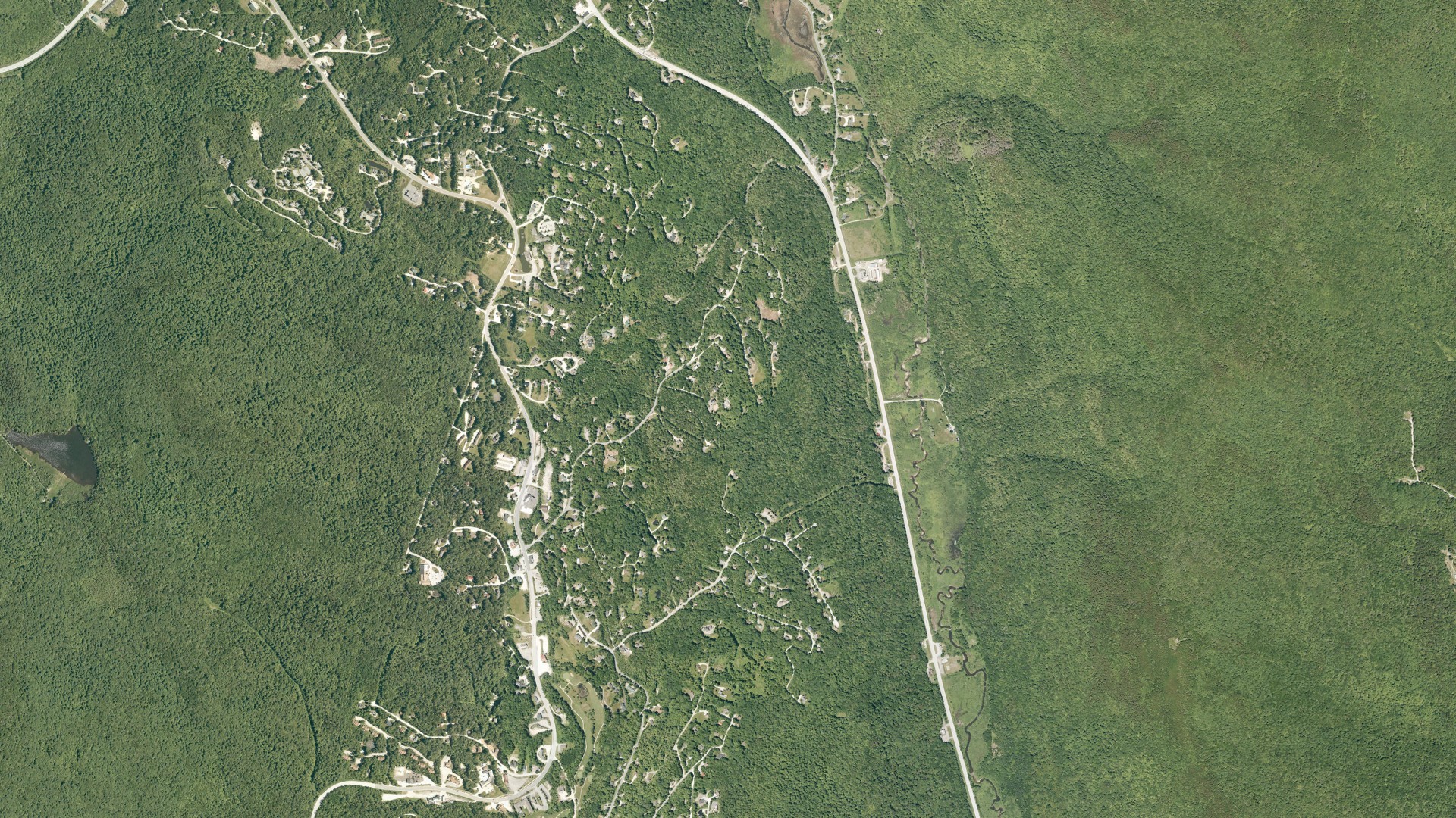 Natural-color aerial photograph of land around Killington Village, Vermont