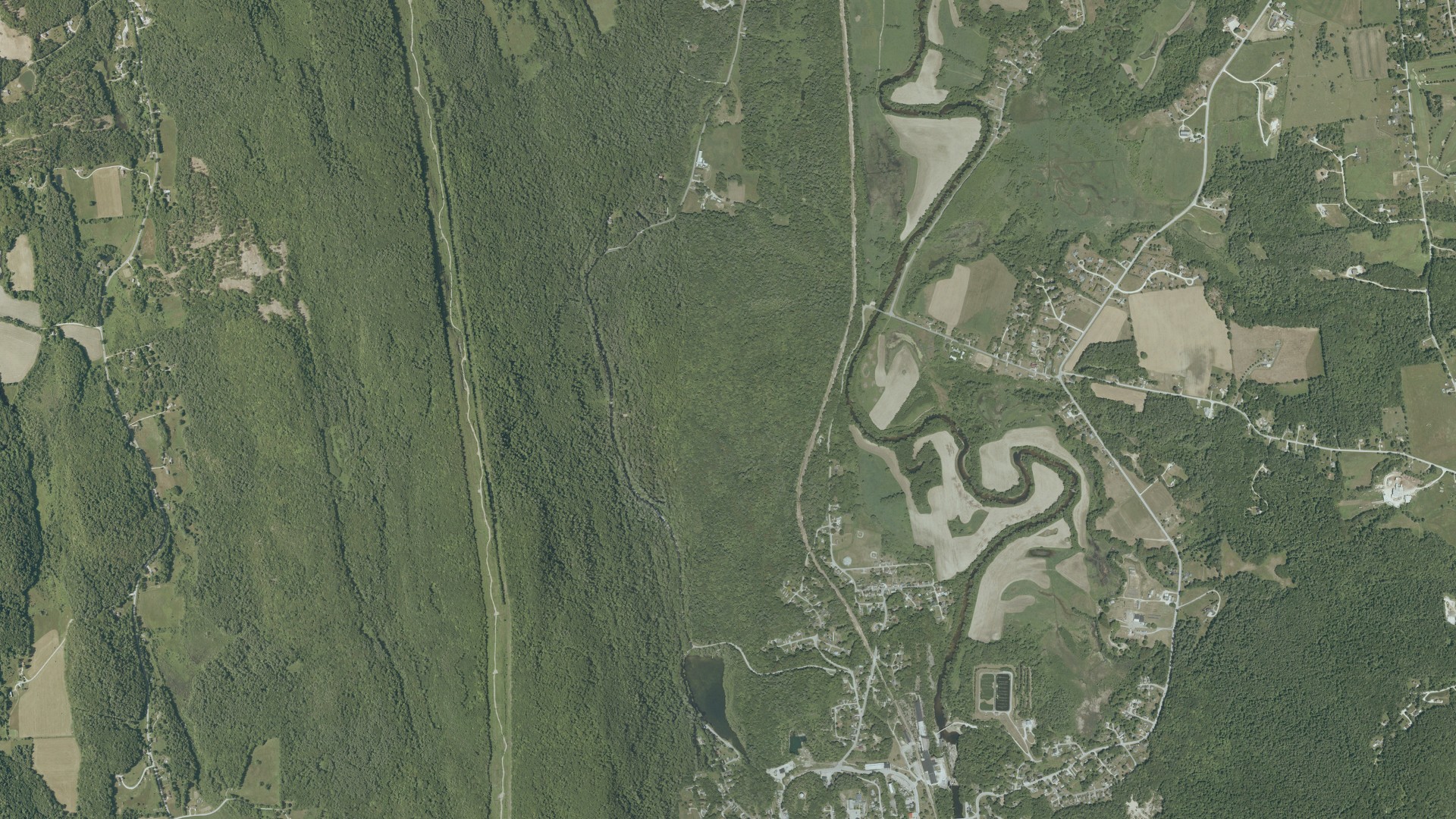 Natural-color aerial photograph of land around Proctor, Vermont
