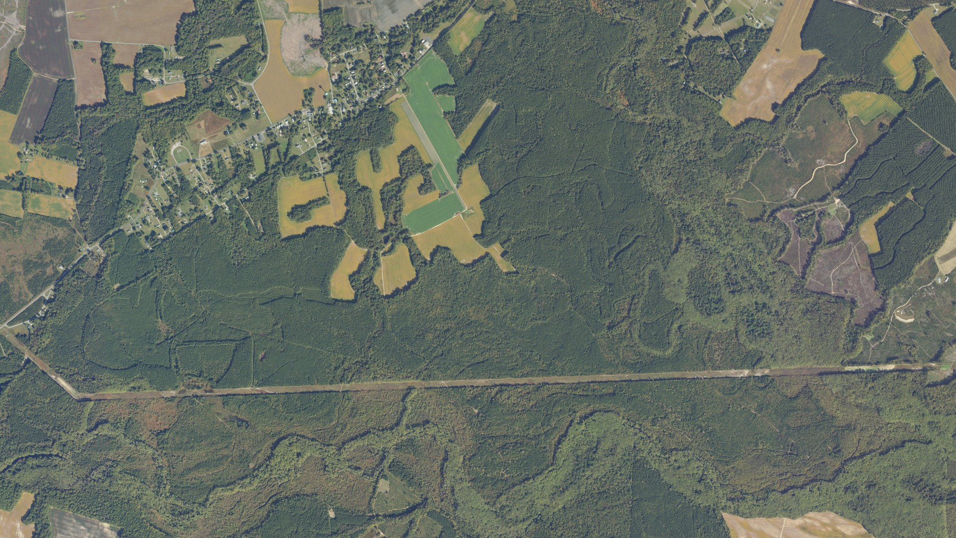 Natural-color aerial photograph of land around Dendron, Virginia