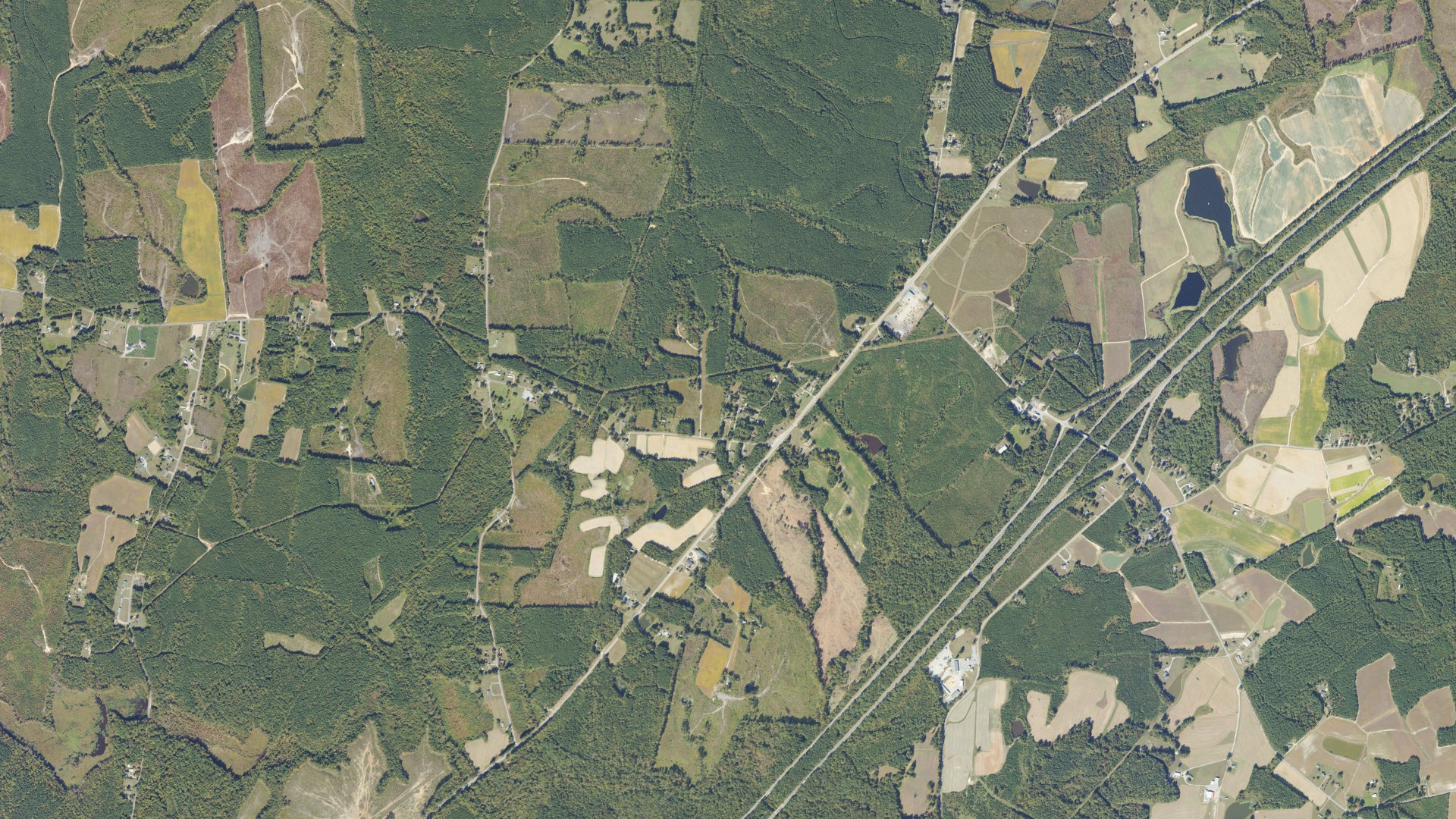Natural-color aerial photograph of land around Warfield, Virginia