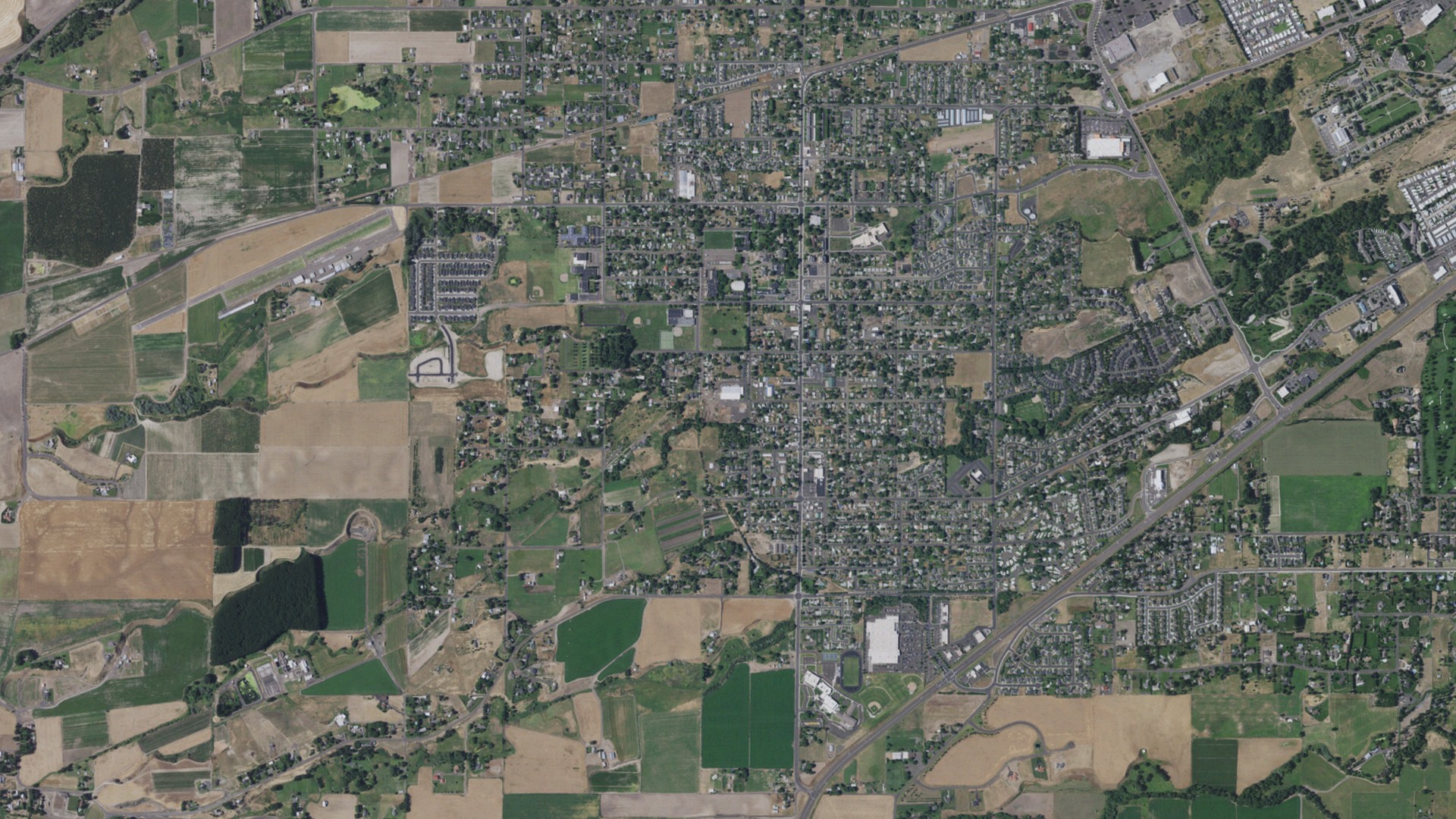 Natural-color aerial photograph of land around College Place, Washington
