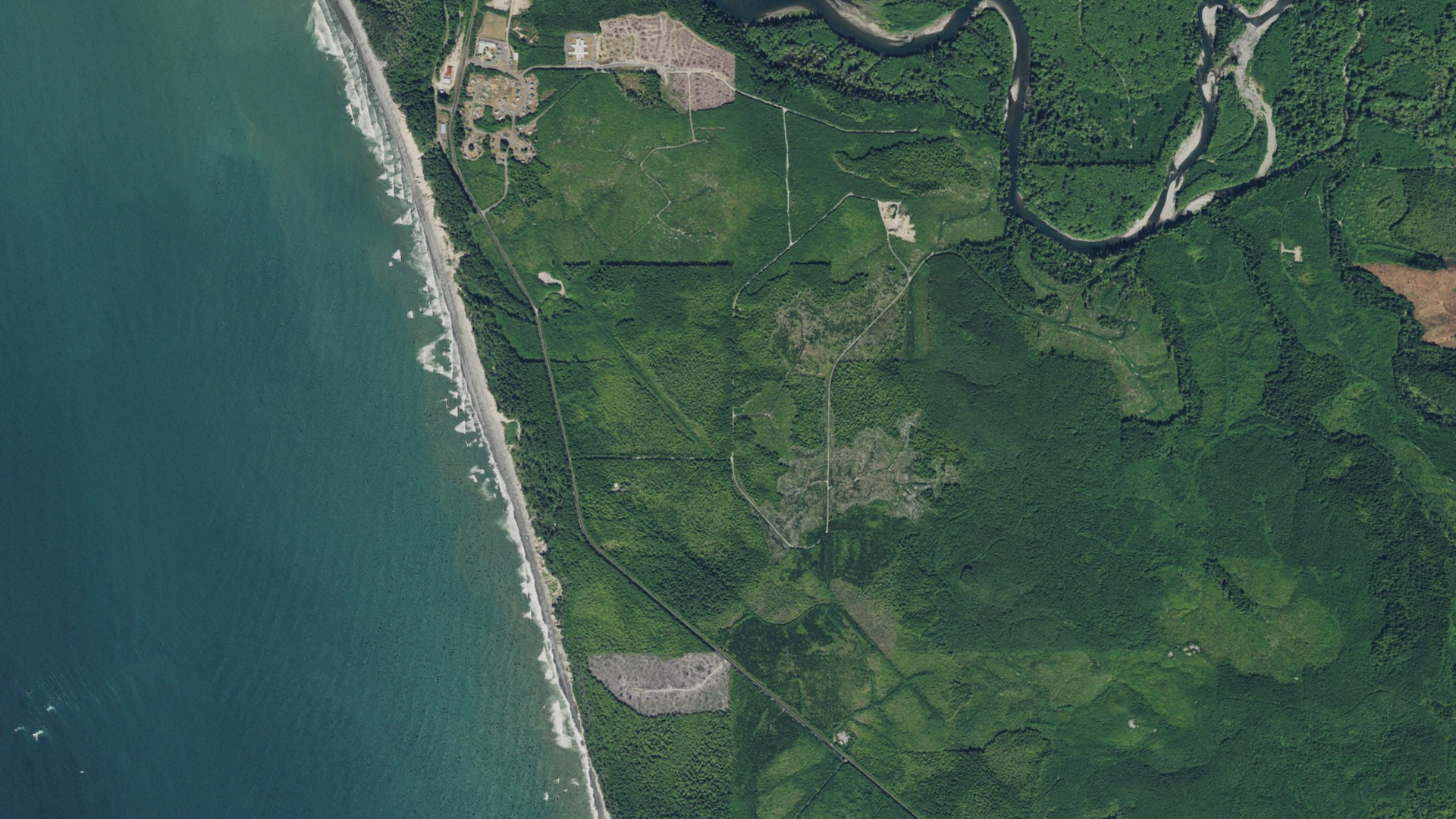 Natural-color aerial photograph of land around Taholah, Washington