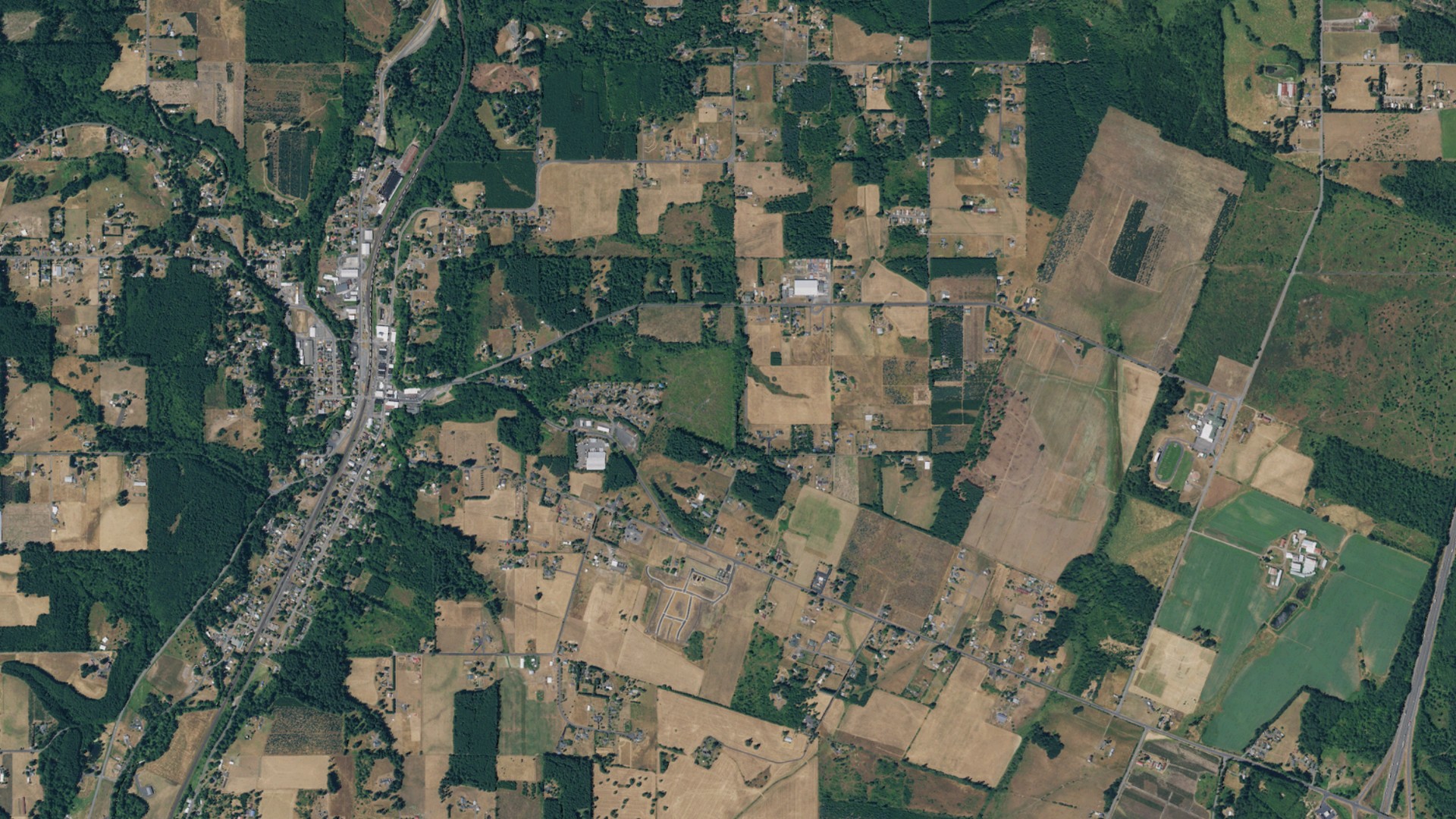 Natural-color aerial photograph of land around Winlock, Washington