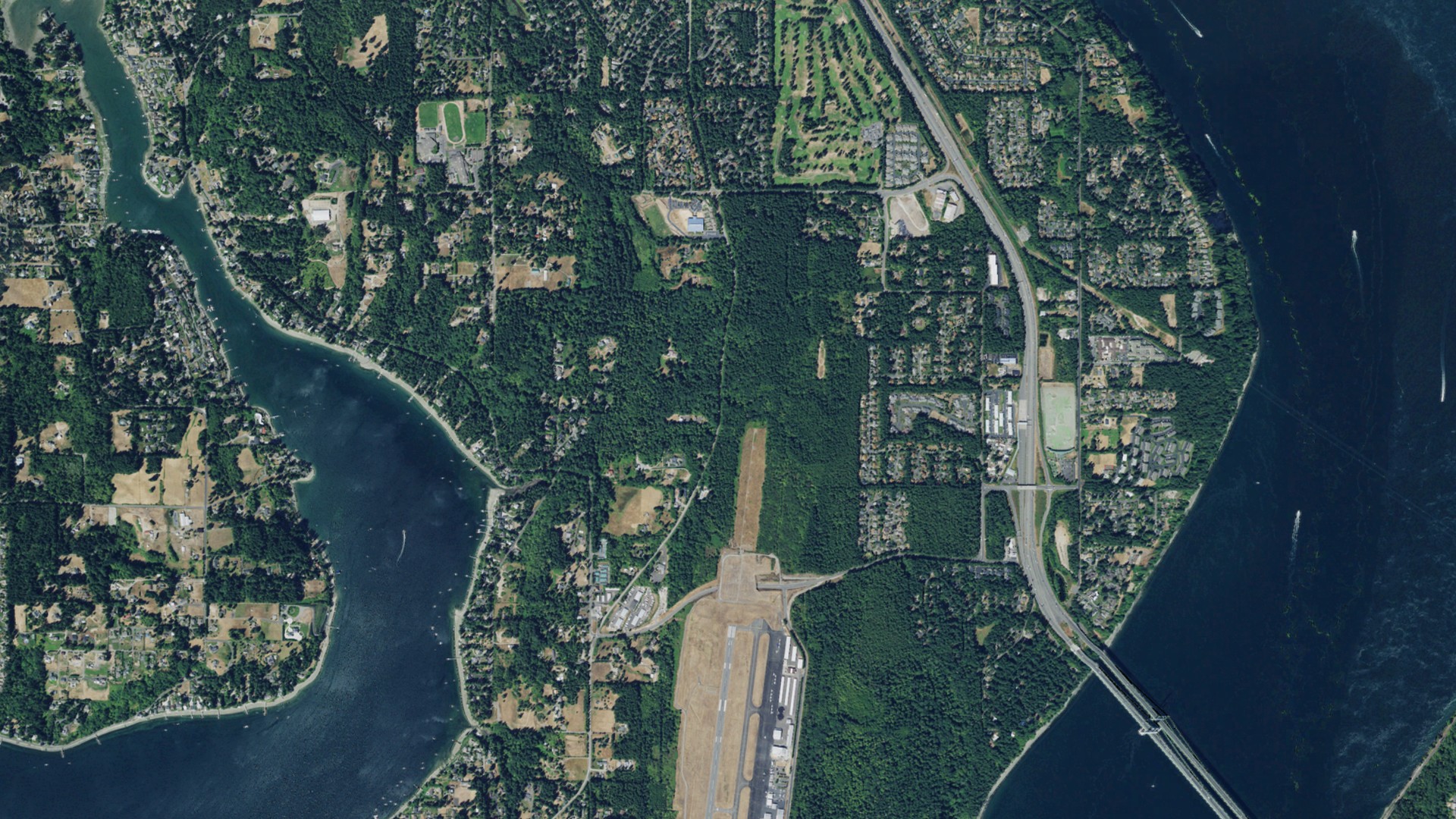 Natural-color aerial photograph of land around Wollochet, Washington