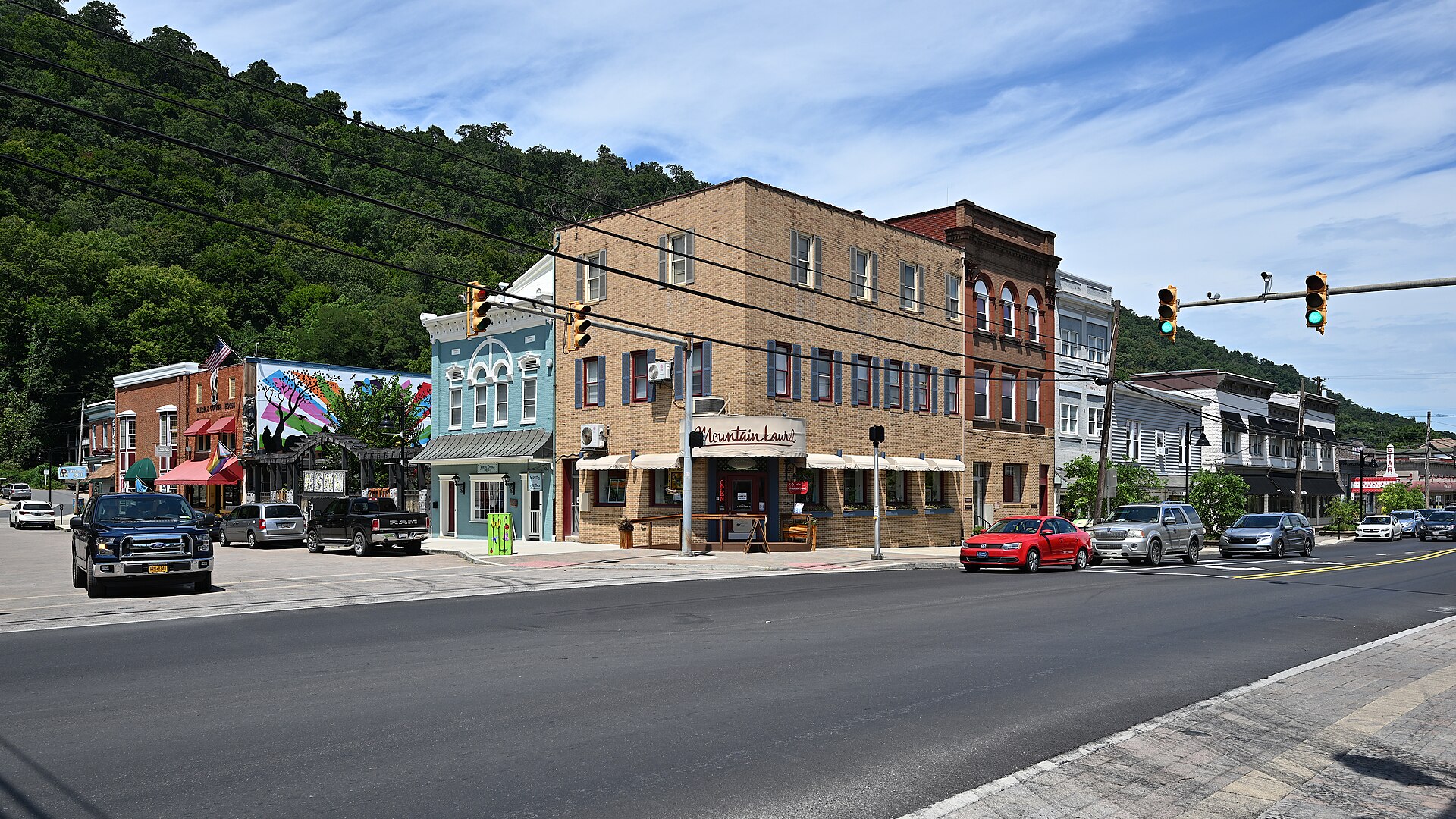 Buildings on the corner of Fairfax St and Washington St in Berkeley Springs, West Virginia. Stores visible include Mountain Laurel, Fairfax Coffee House, and the Star theater. — Bath (Berkeley Springs), West Virginia