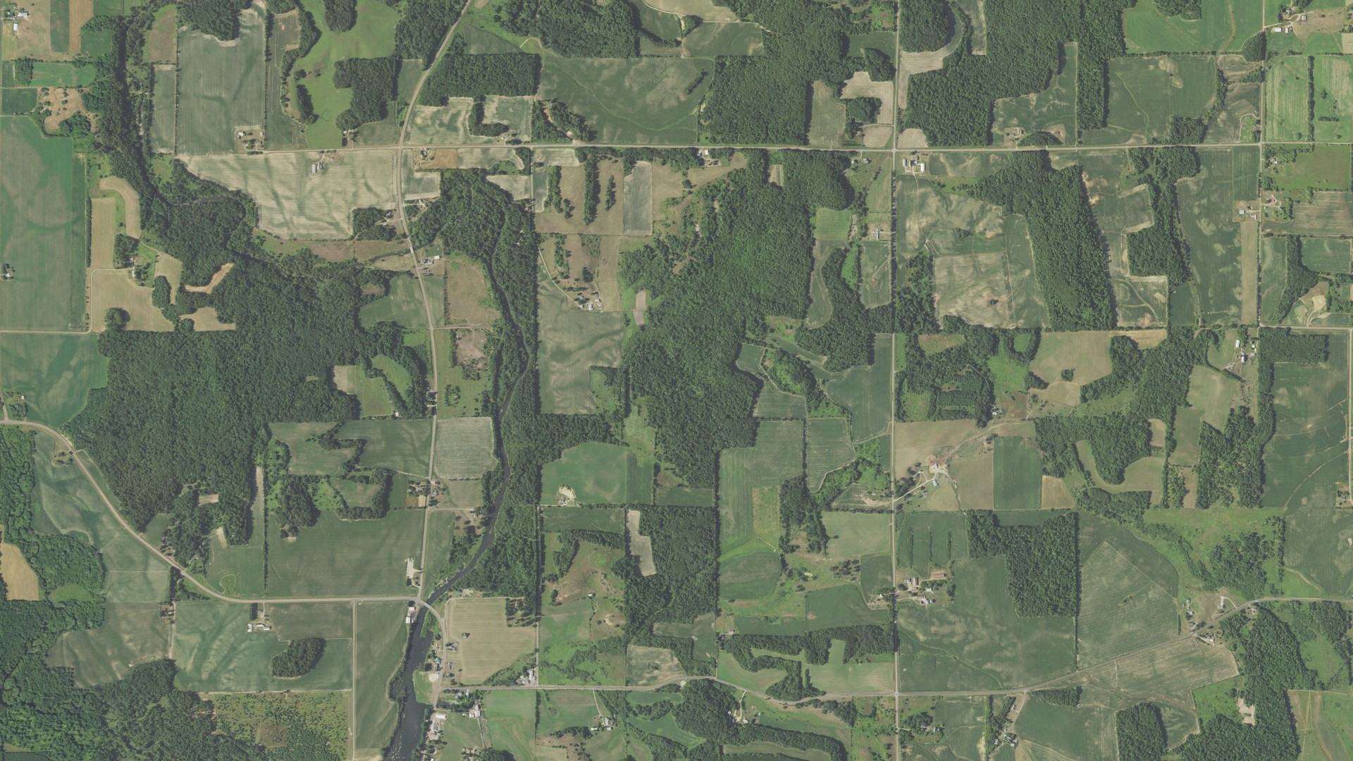 Natural-color aerial photograph of land around Prairie Farm, Wisconsin