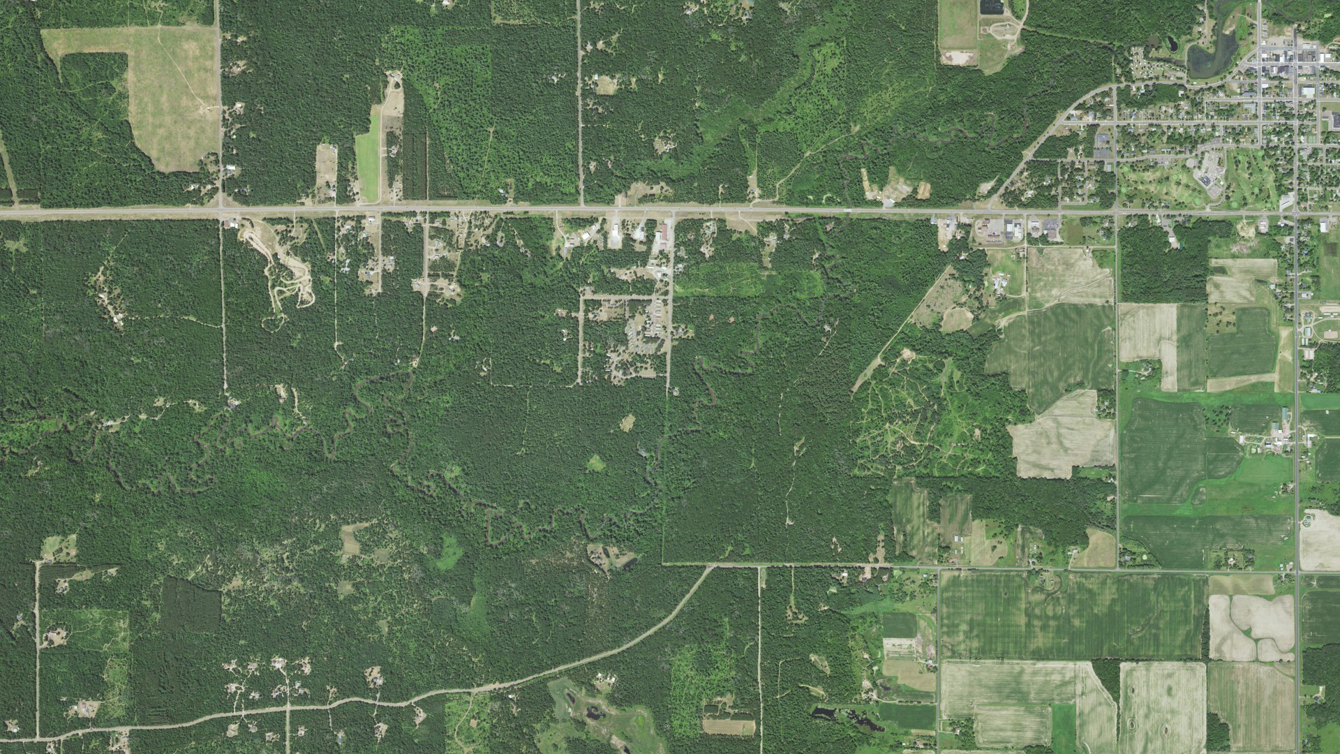 Natural-color aerial photograph of land around Grantsburg, Wisconsin