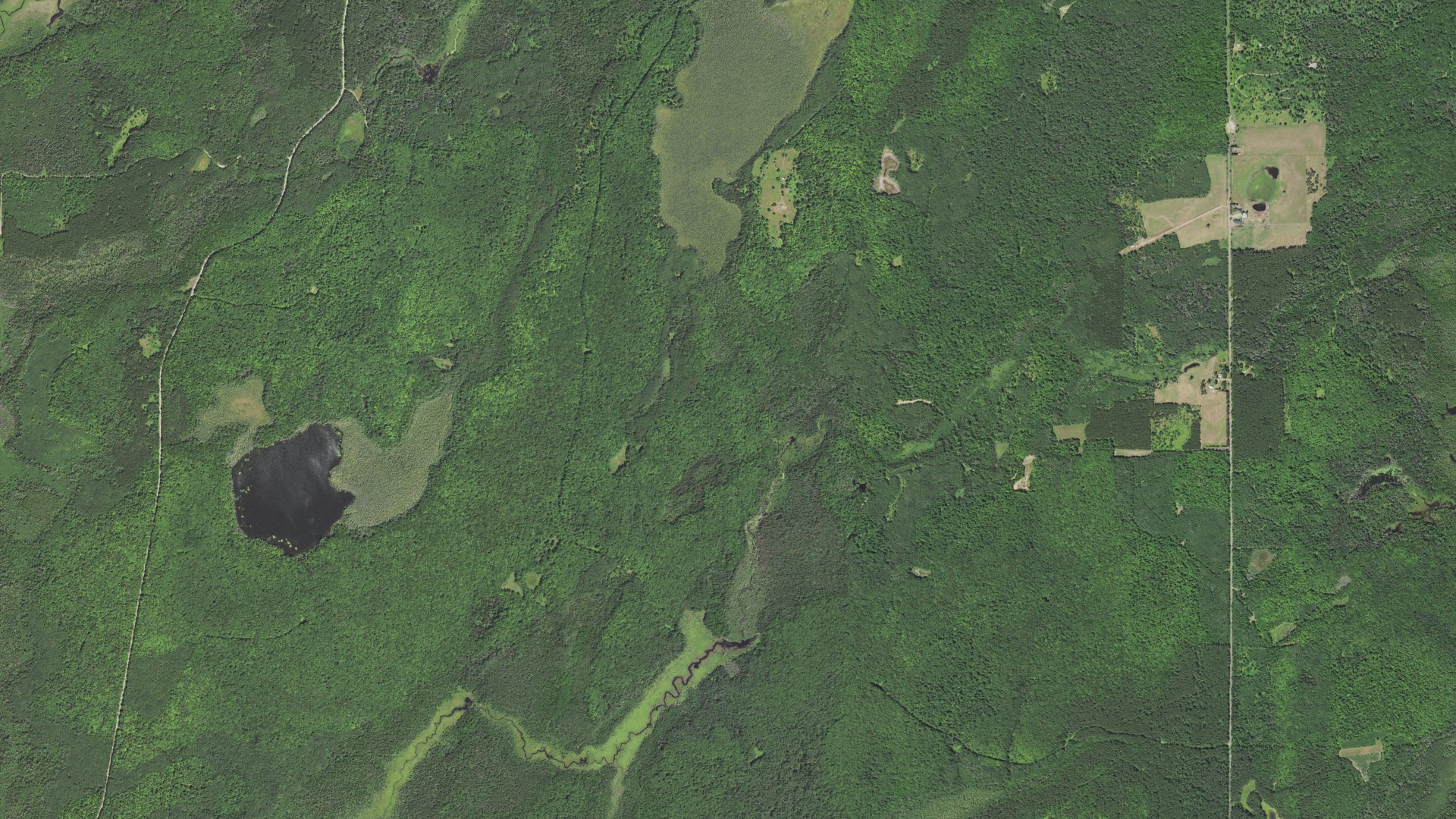 Natural-color aerial photograph of land around Popple River, Wisconsin