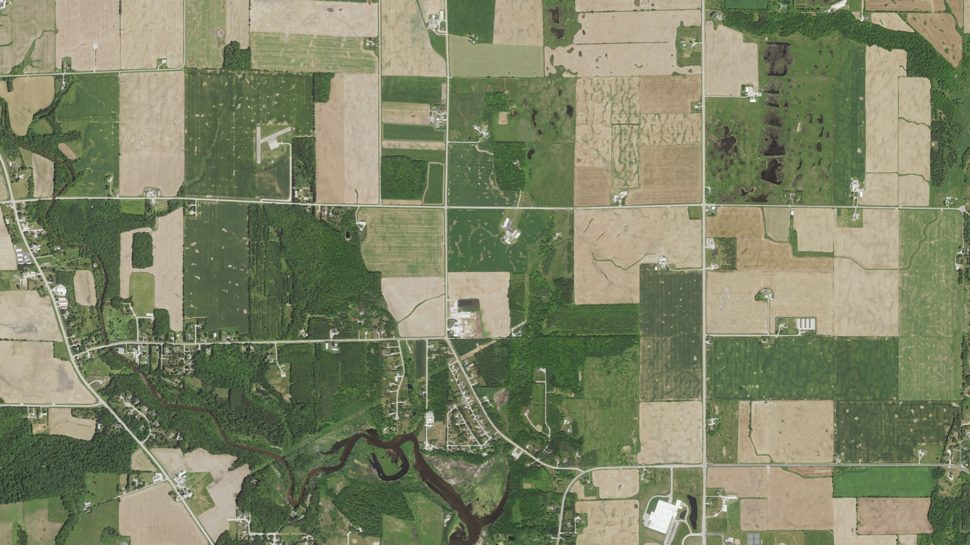 Natural-color aerial photograph of land around Two Rivers, Wisconsin