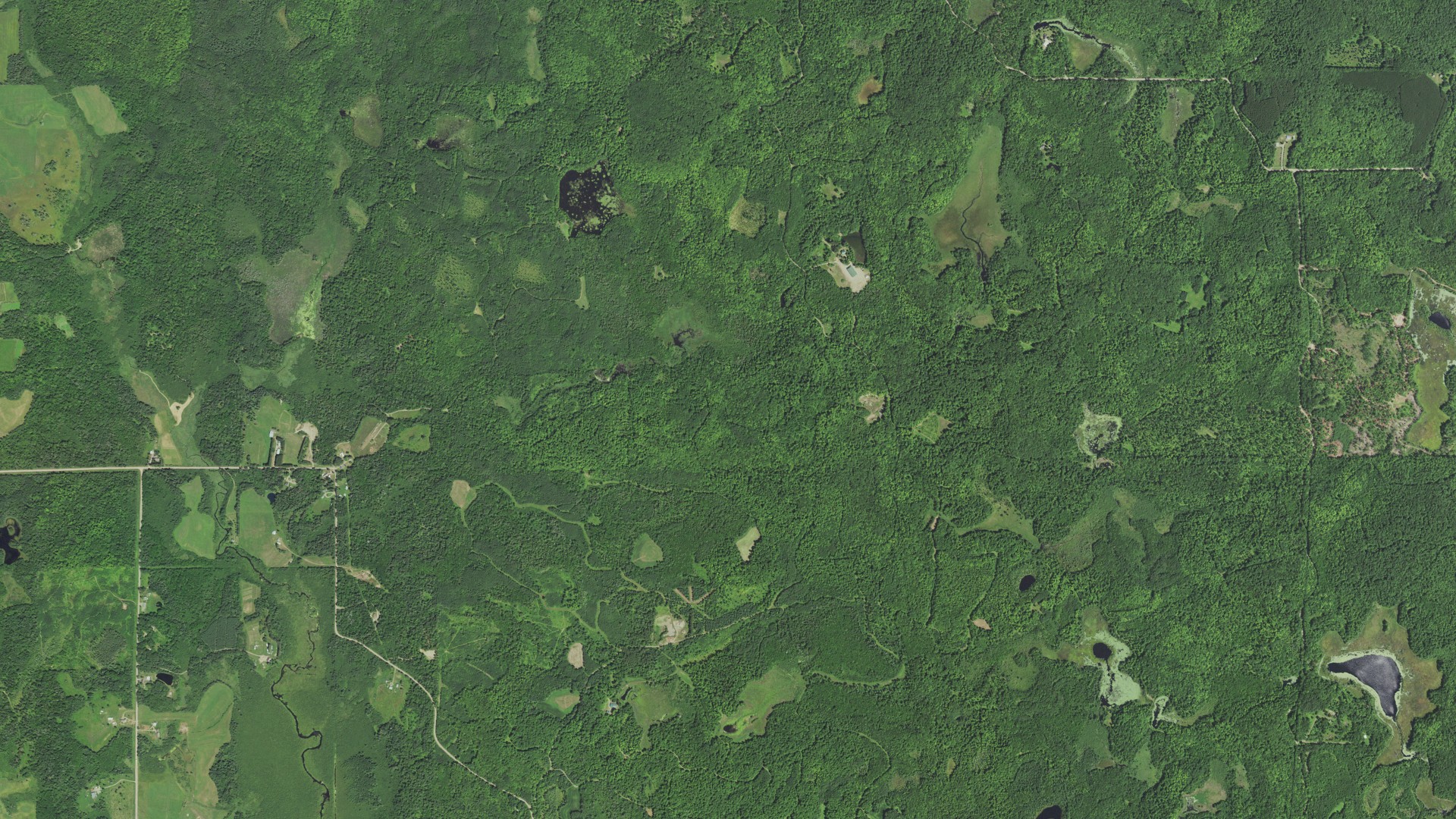 Natural-color aerial photograph of land around Hill, Wisconsin