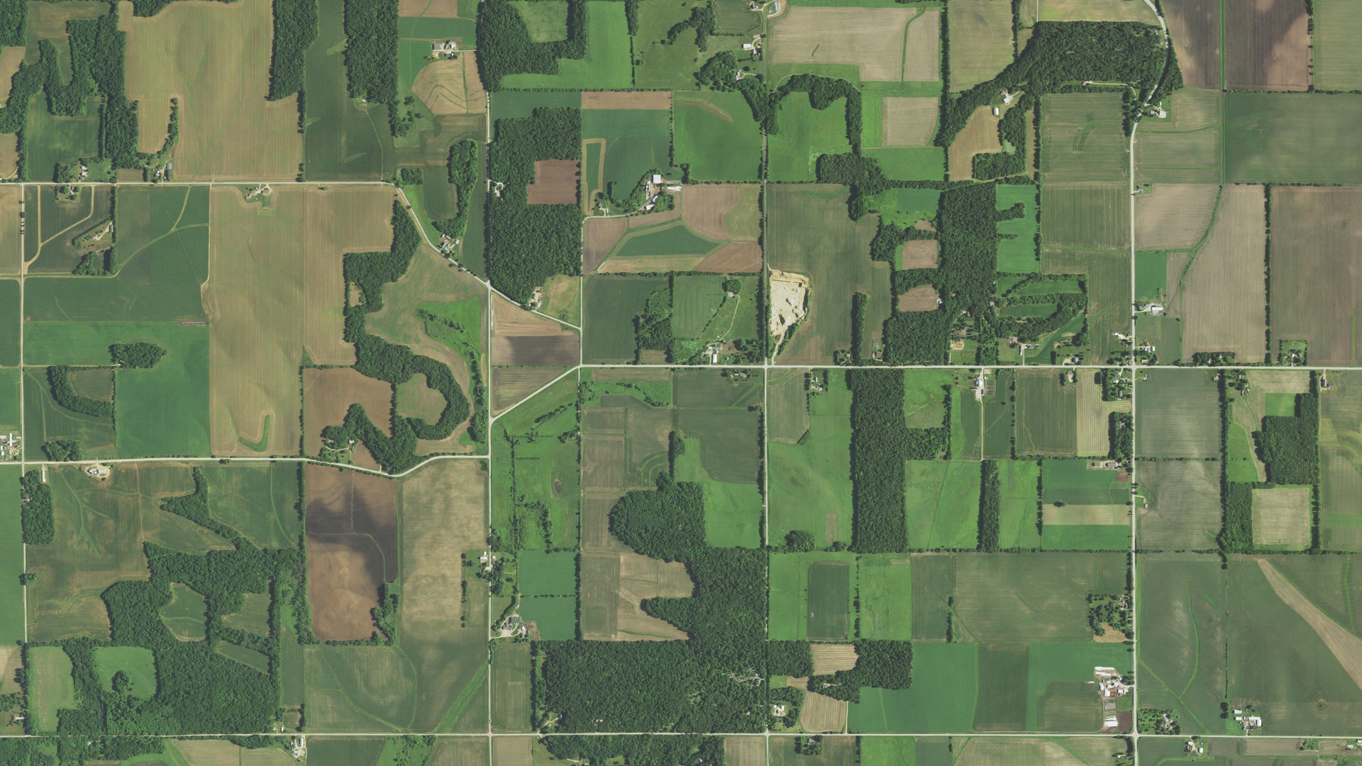 Natural-color aerial photograph of land around Magnolia, Wisconsin