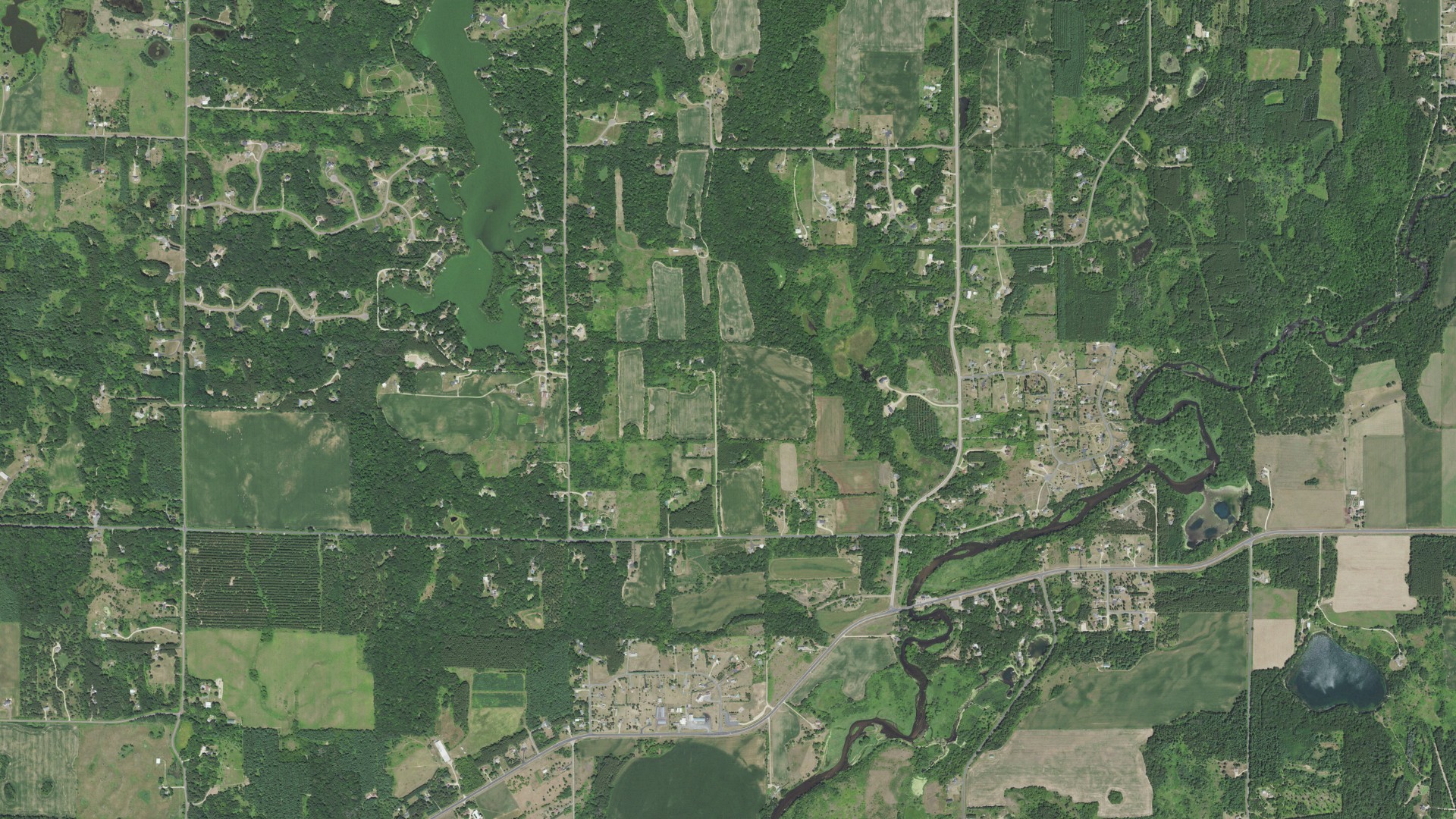 Natural-color aerial photograph of land around Star Prairie, Wisconsin