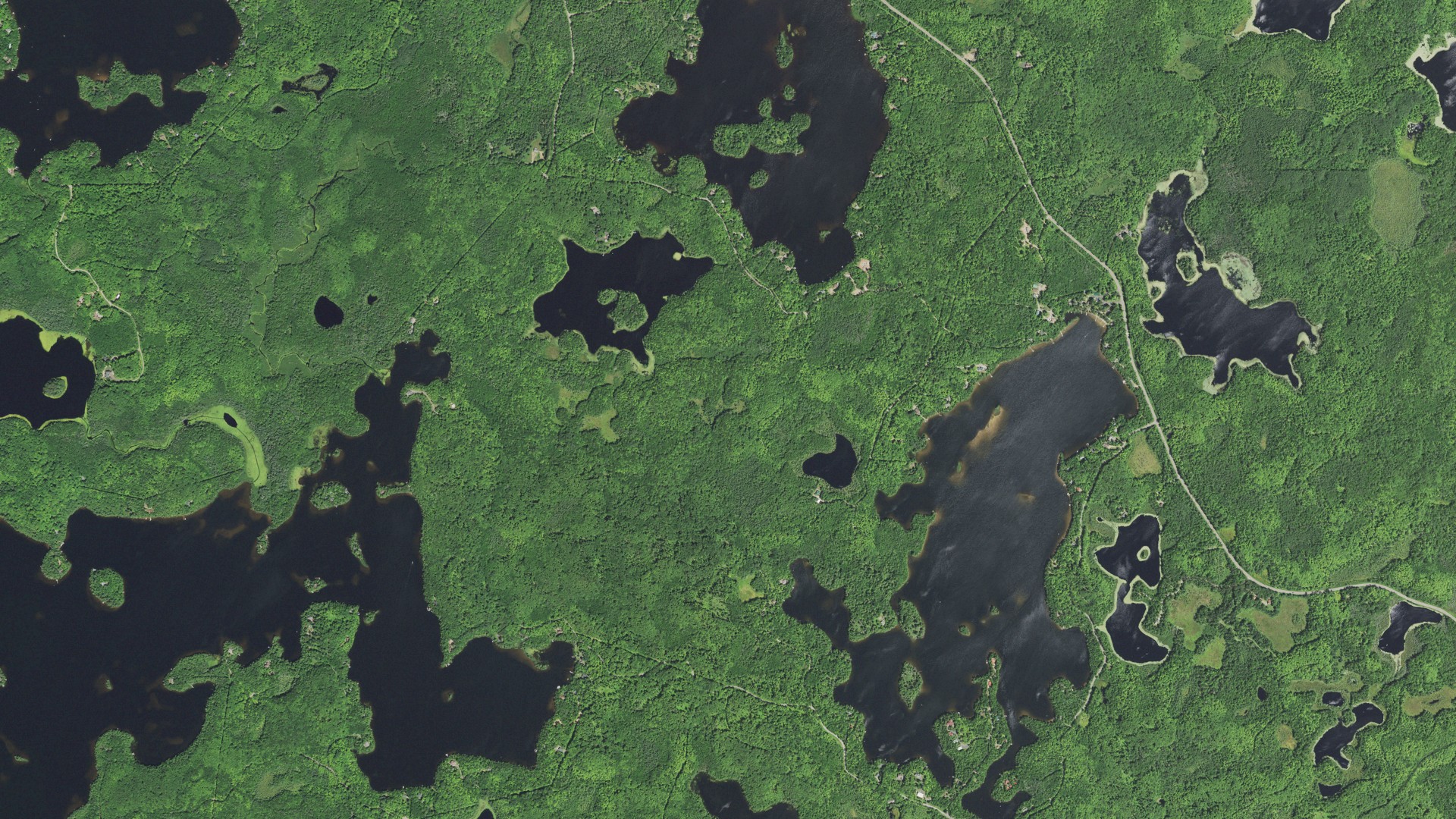 Natural-color aerial photograph of land around Presque Isle, Wisconsin