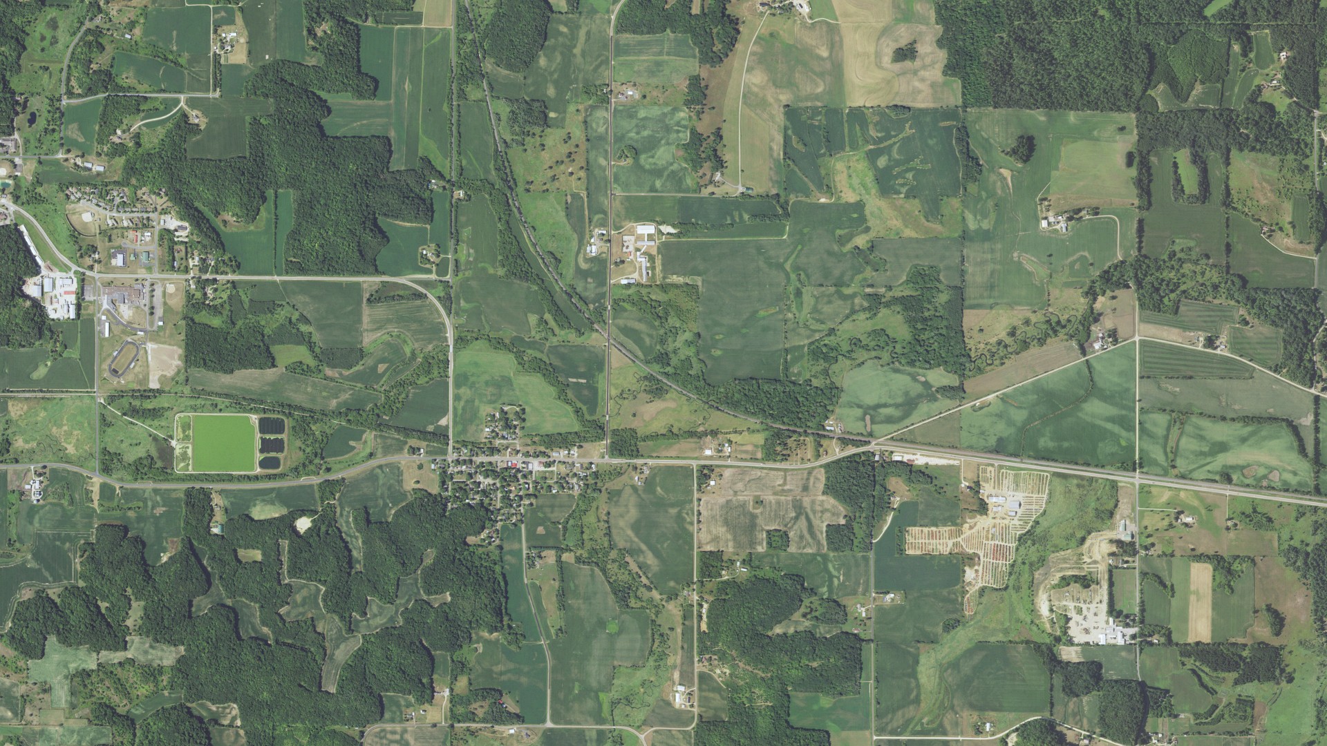 Natural-color aerial photograph of land around Downing, Wisconsin