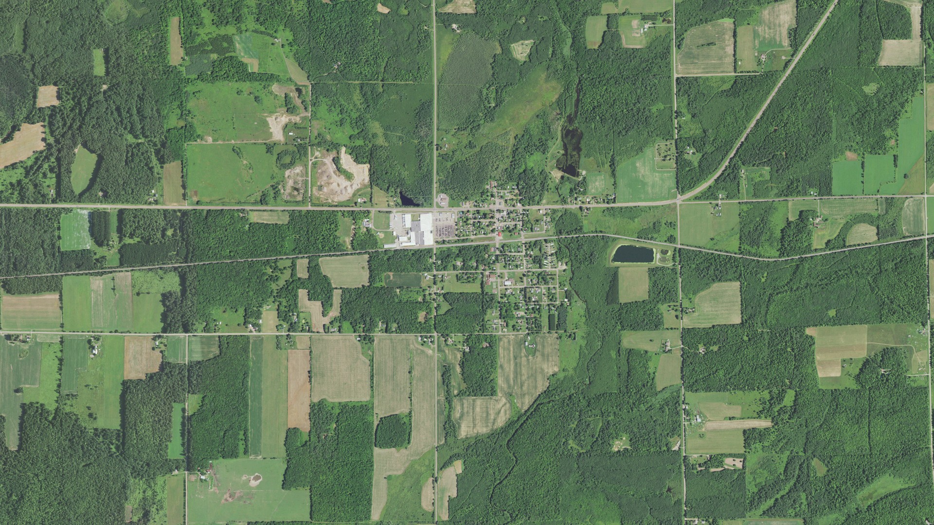 Natural-color aerial photograph of land around Hawkins, Wisconsin