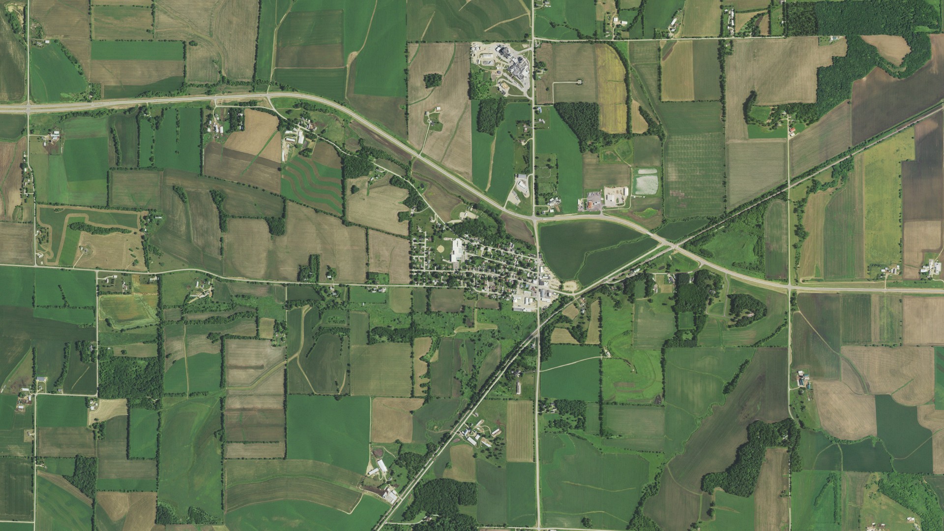 Natural-color aerial photograph of land around Juda, Wisconsin