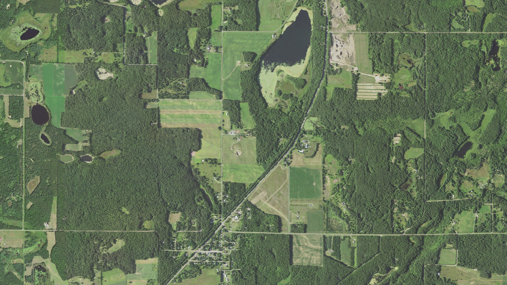Natural-color aerial photograph of land around Lewis, Wisconsin