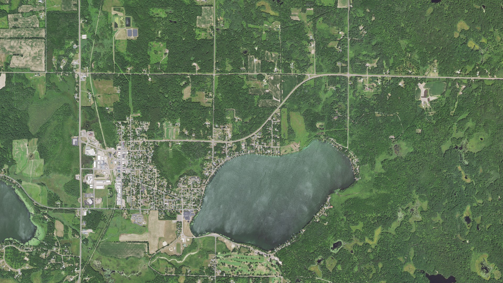 Natural-color aerial photograph of land around Luck, Wisconsin