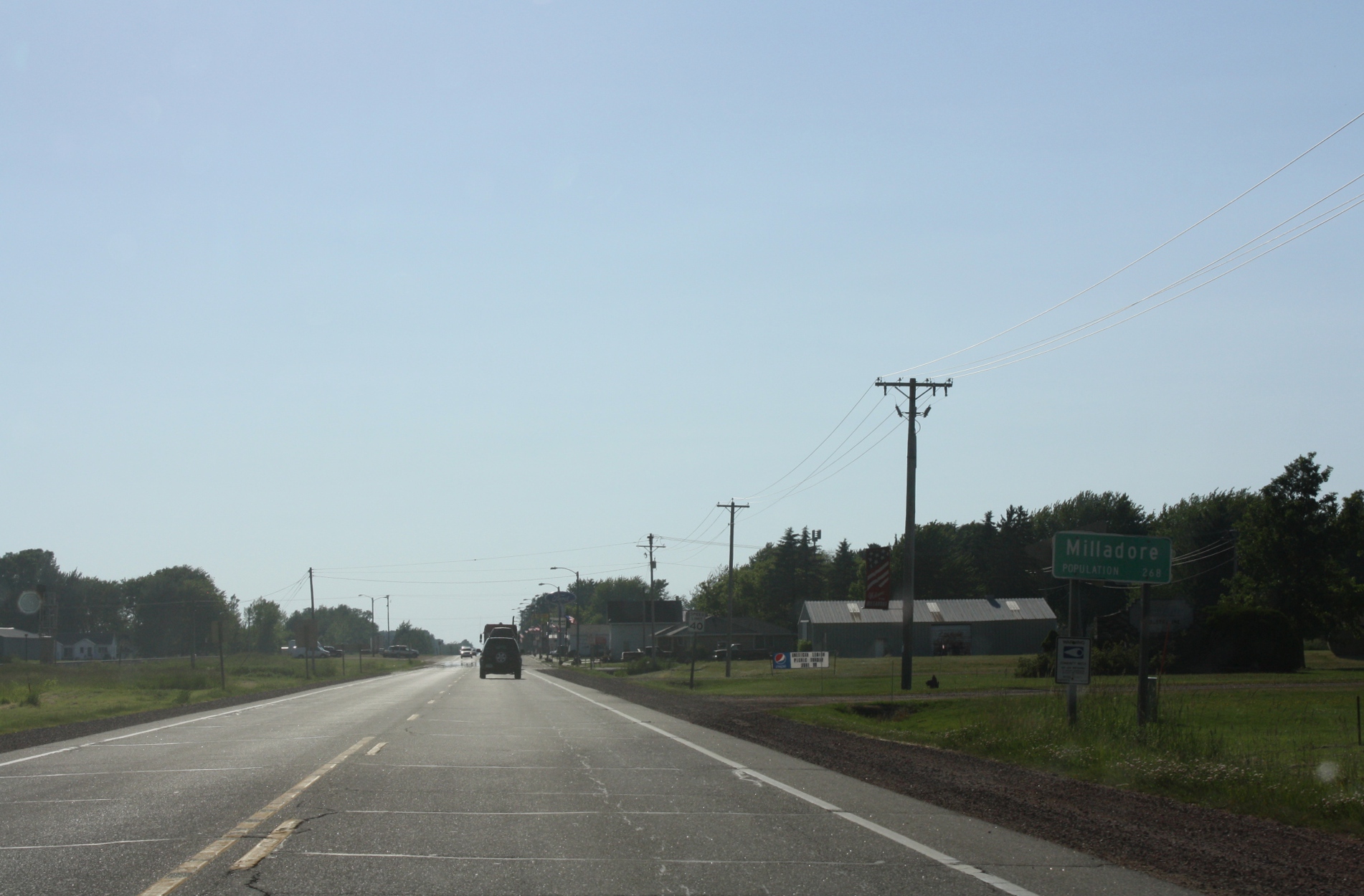Looking west at the sign for w:Milladore, Wisconsin. This file was uploaded with Commonist.