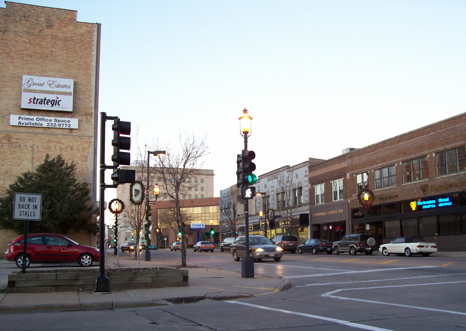 Looking northerly at downtown Oshkosh, Wisconsin, USA at Main Street which is U.S. Highway 45. Cropped from the original.