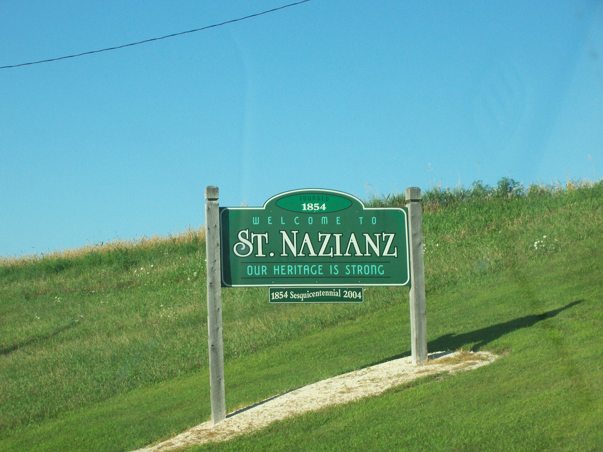 The welcome sign in St. Nazianz, Wisconsin. I took this image myself on August 12, 2006.