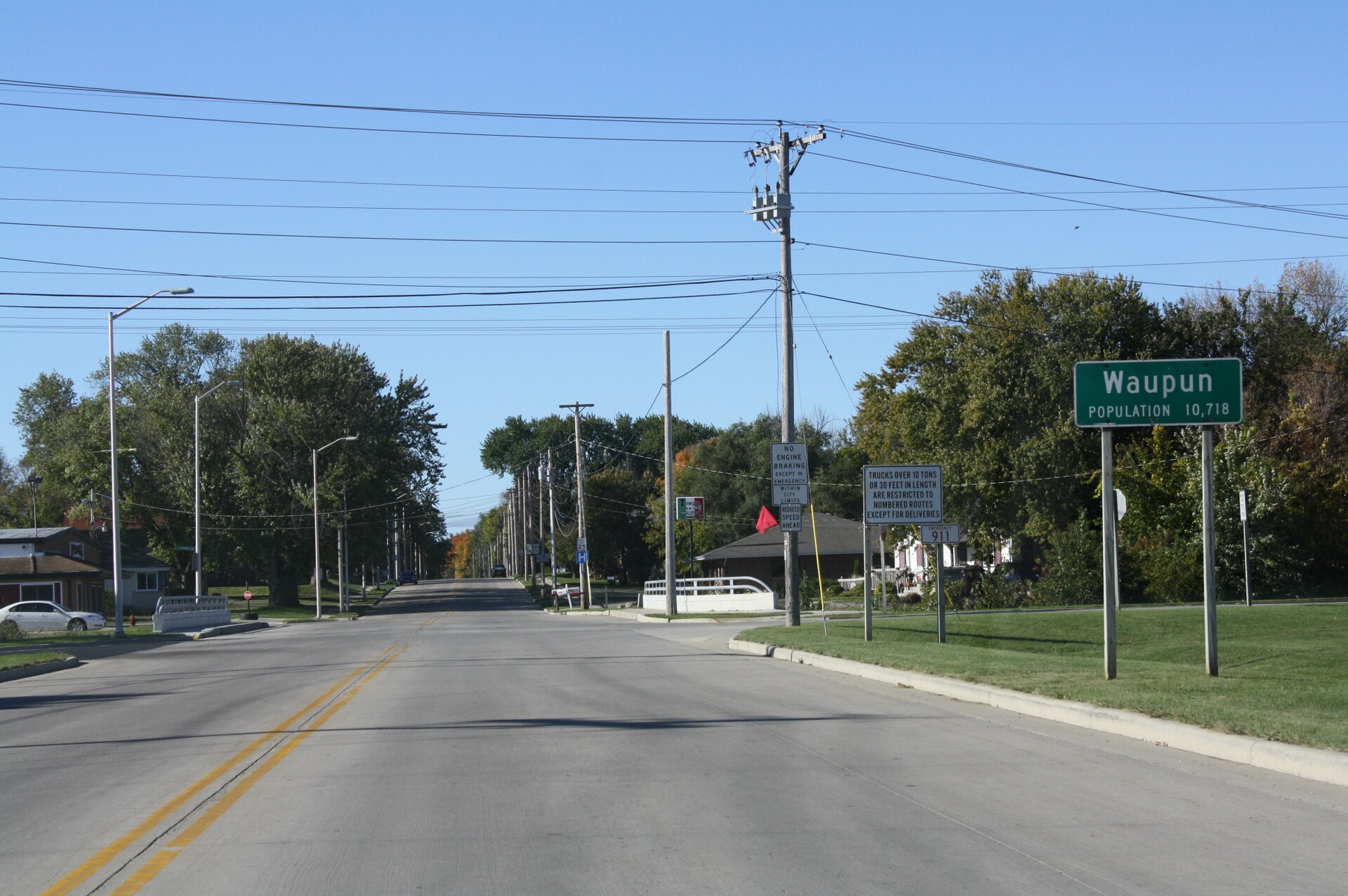 Looking south at the welcome sign for w:Waupun, Wisconsin on w:Wisconsin Highway 26.